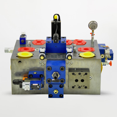 Manifold blocks made to customer-supplied specifications